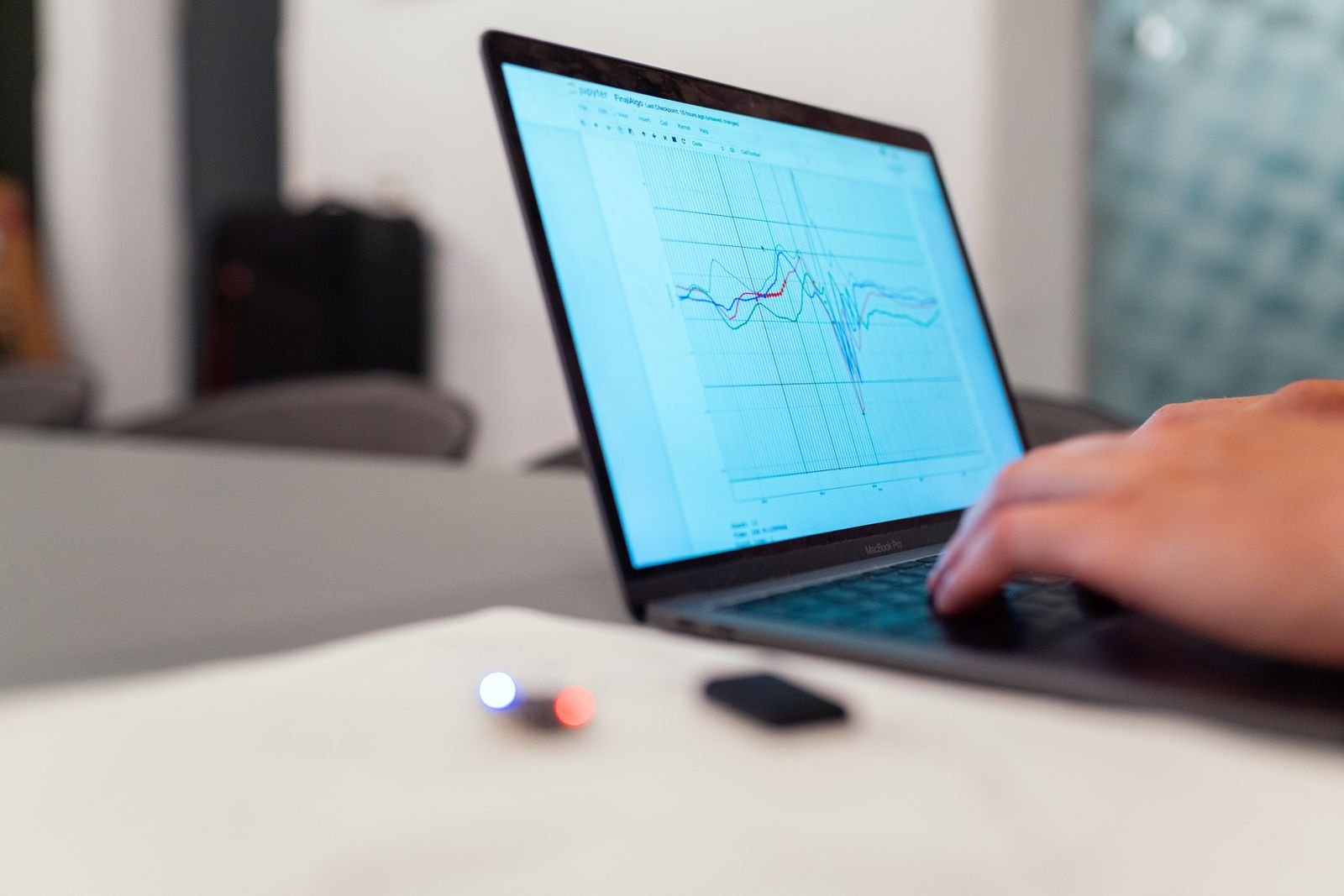 A laptop screen showing a line chart of data