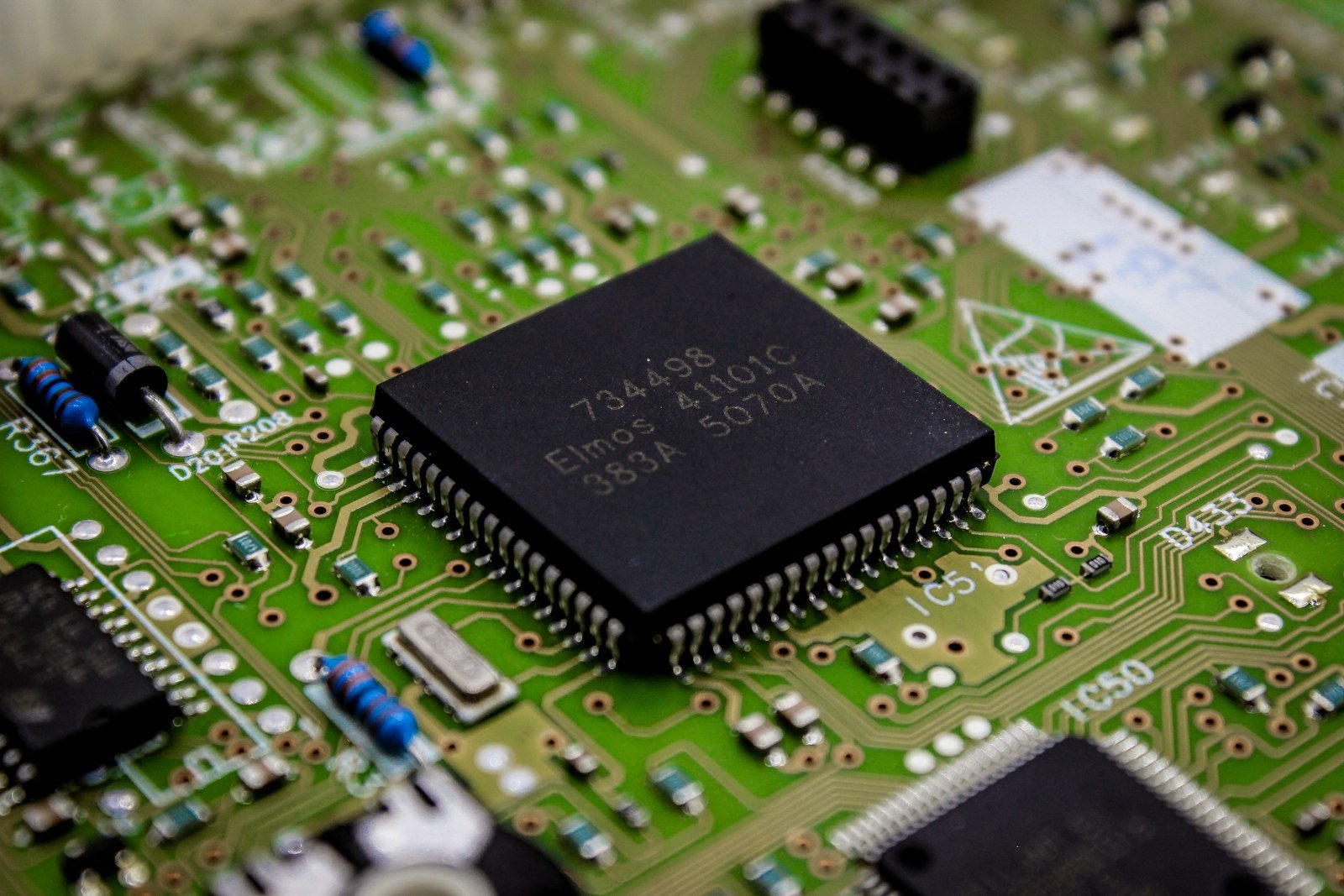 Close-up of a microchip mounted on a printed circuit board