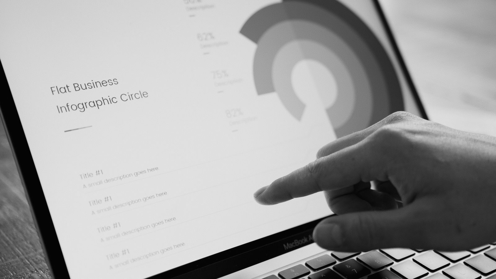 A person arranging design layouts and color choices on a screen