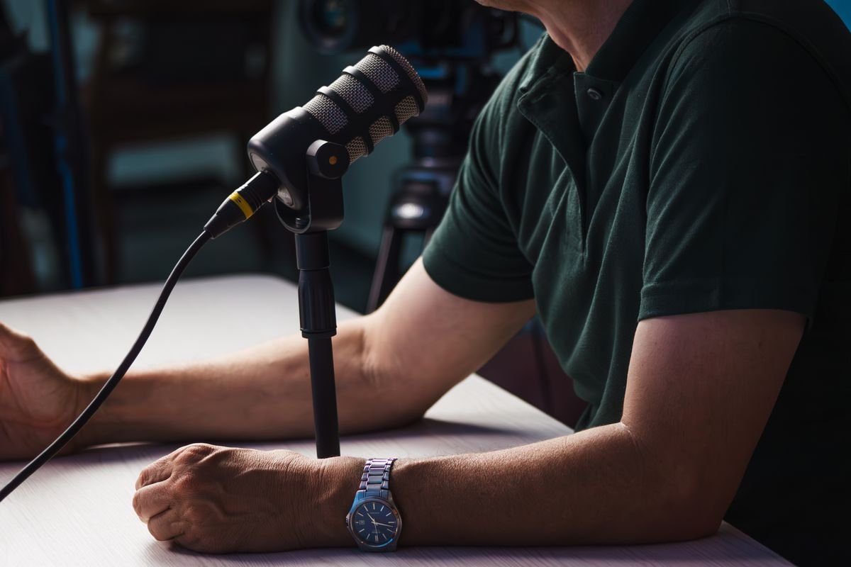 A podcast recording setup with a microphone in a studio