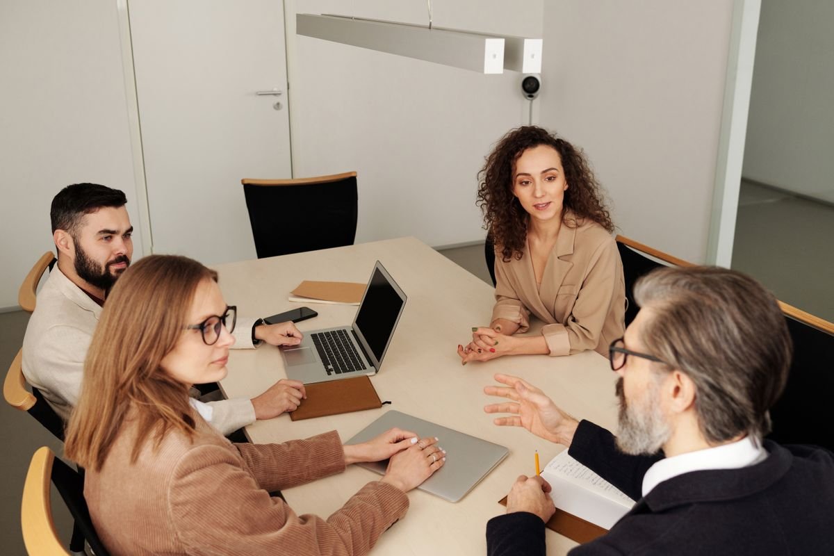 A team in a meeting whose transcript will be turned into slides