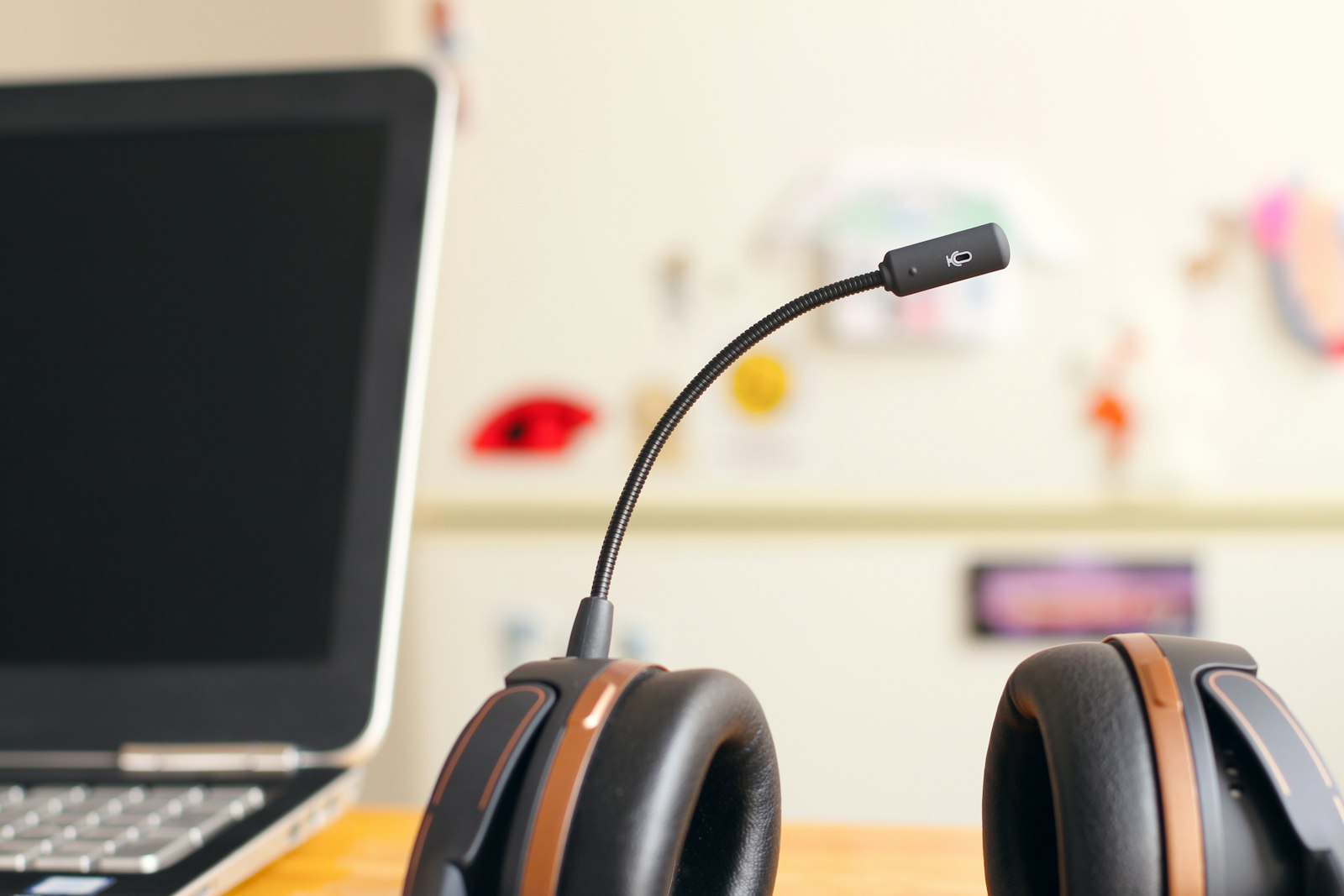 Headset near a laptop, representing AI voice agent platforms for customer support
