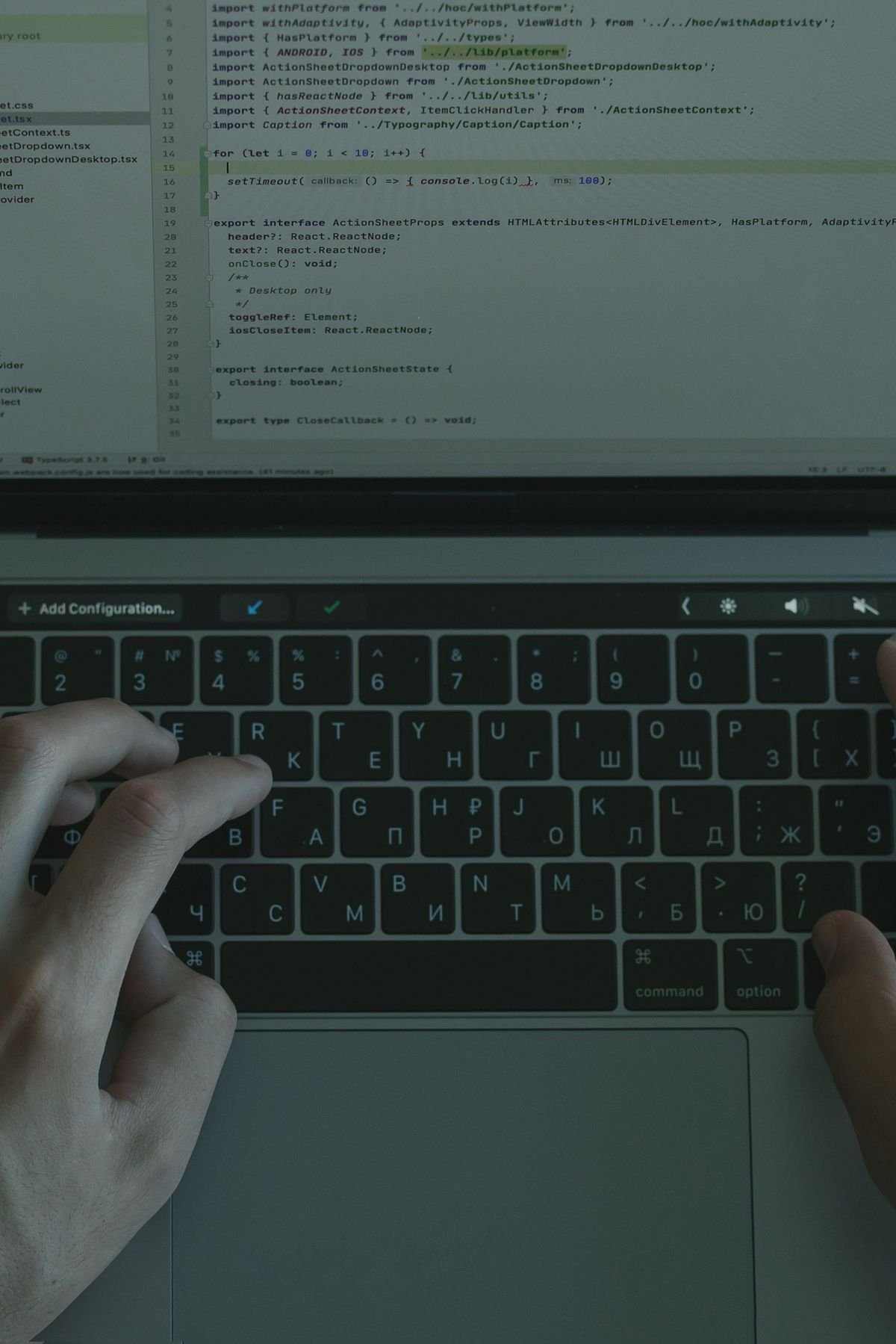 Close-up of a person coding on a laptop, illustrating everyday programming practice
