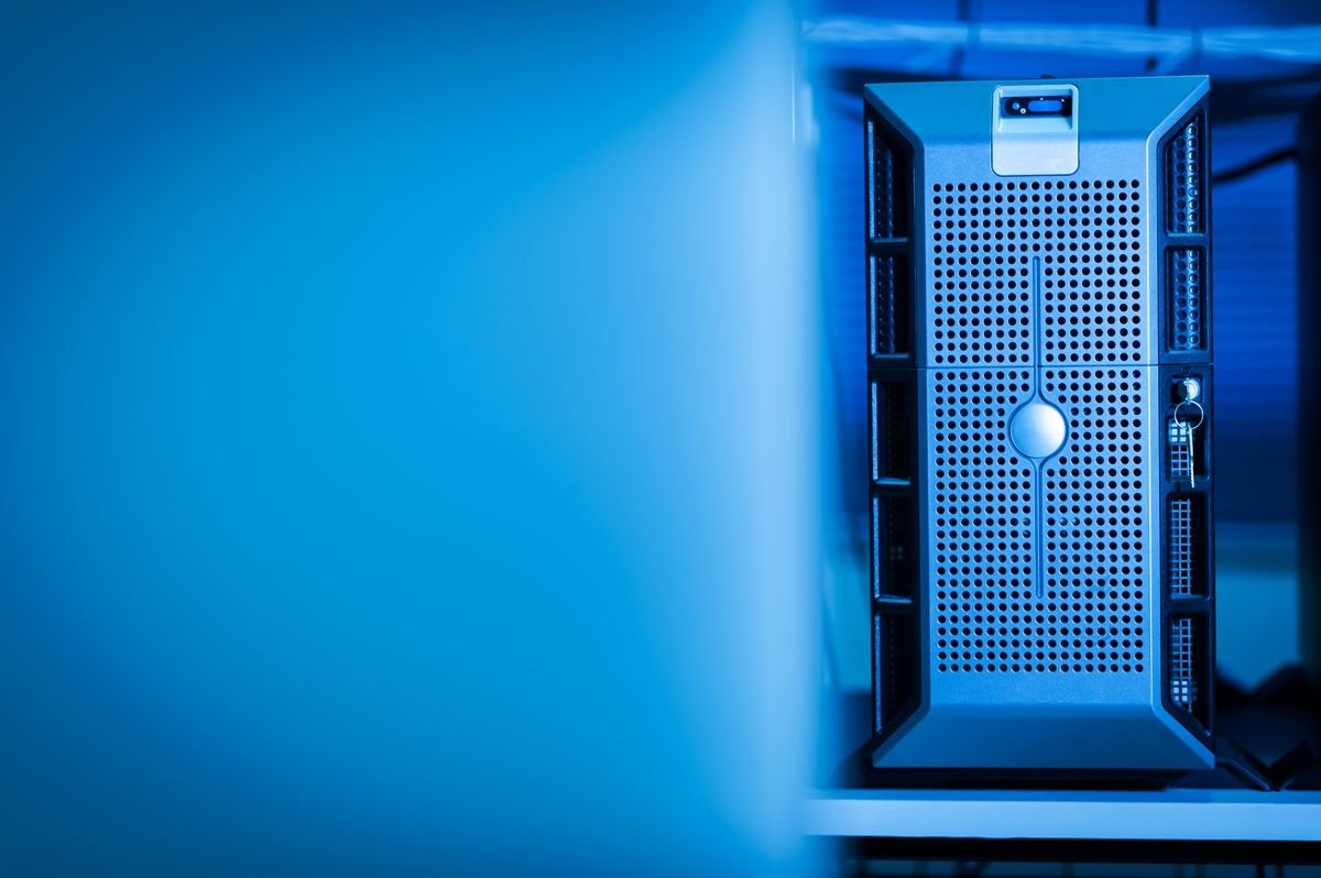 A server in a blue-lit data center where AI vendors process and store prompts